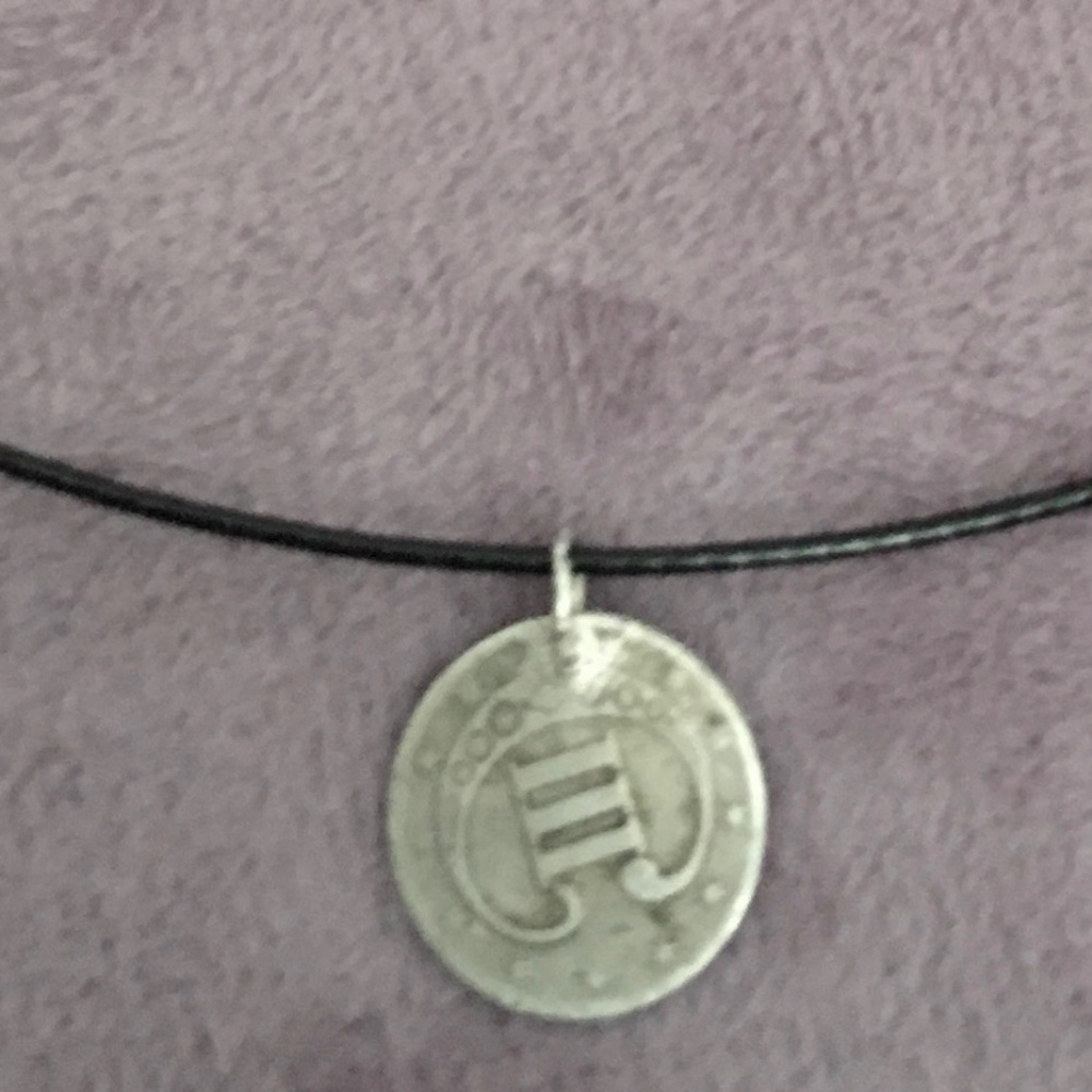 US Three Cent Silver Piece .  Very cool conversation piece. Lots of Detail